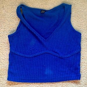A blue ribbed crop tank